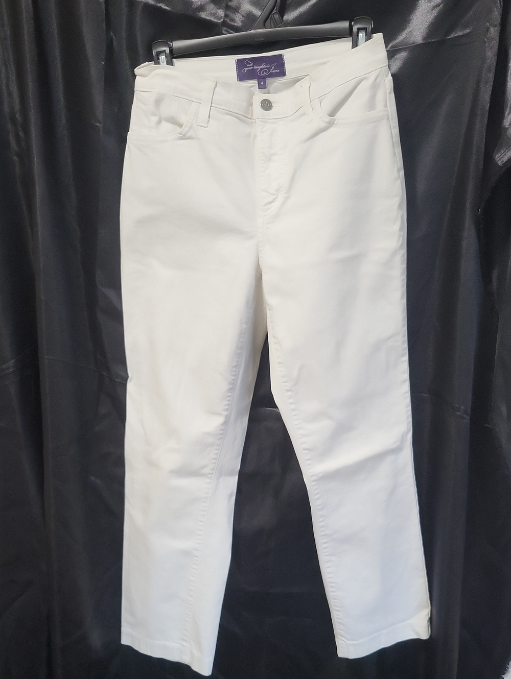 NYDJ white stretch denim jeans with Lift-Tuck Technology. Size 4